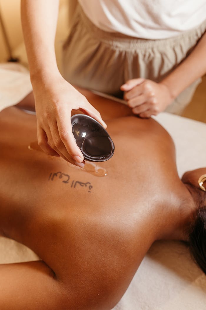 A calming massage therapy session using aromatic oils for ultimate relaxation and wellbeing.